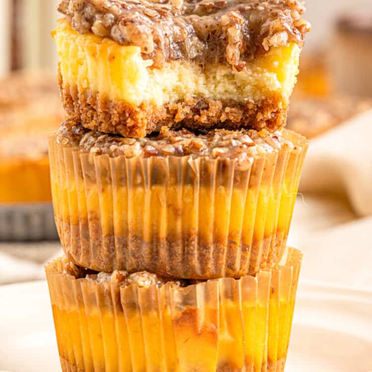 Pecan Pie Mini Cheesecakes stacked on top of each other