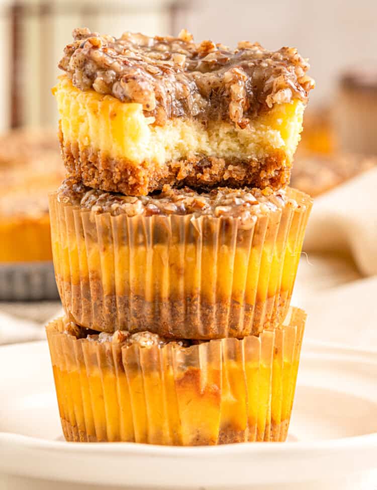 Pecan Pie Mini Cheesecakes stacked on top of each other