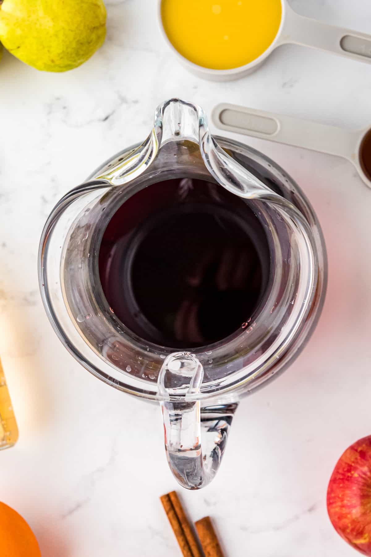 Overhead image of pitcher with red wine