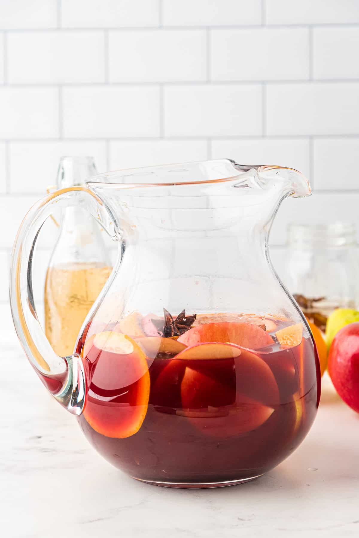 Glass pitcher with red sangria