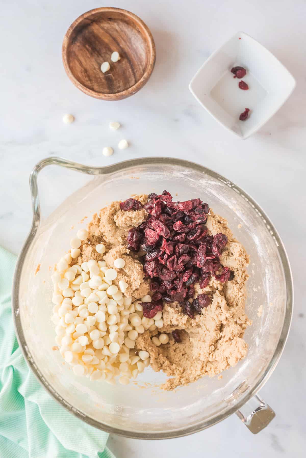 Cookie dough with white chips and dried cranberries on top