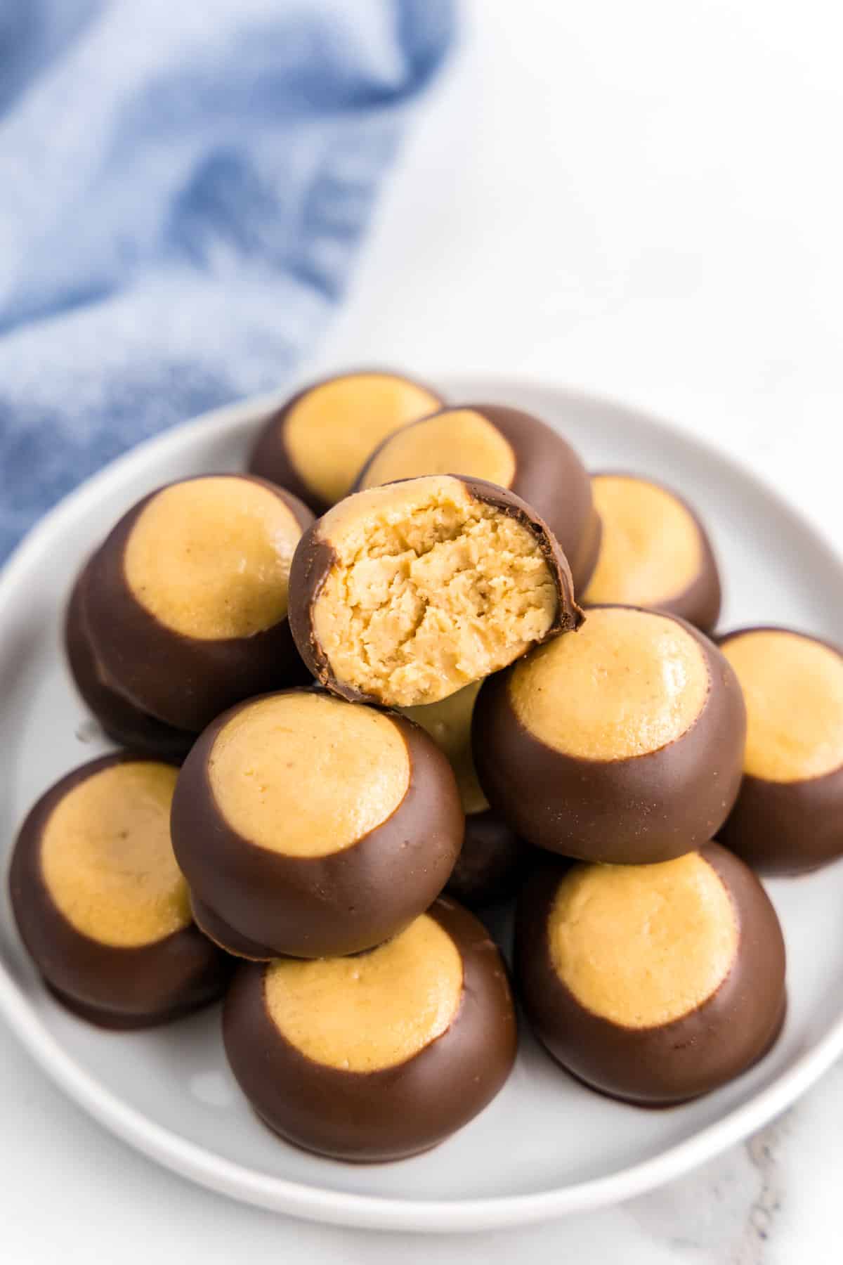 White plate with stack of buckeye candy