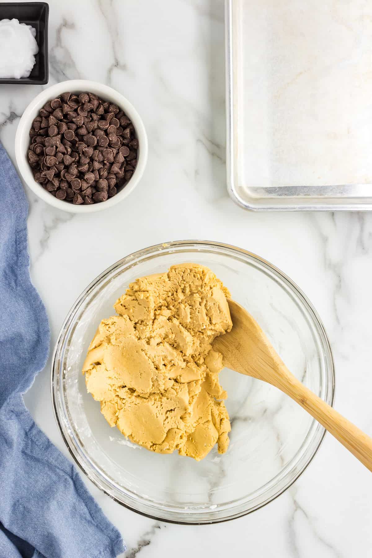 Glass bowl with peanut butter mixture for Buckeyes