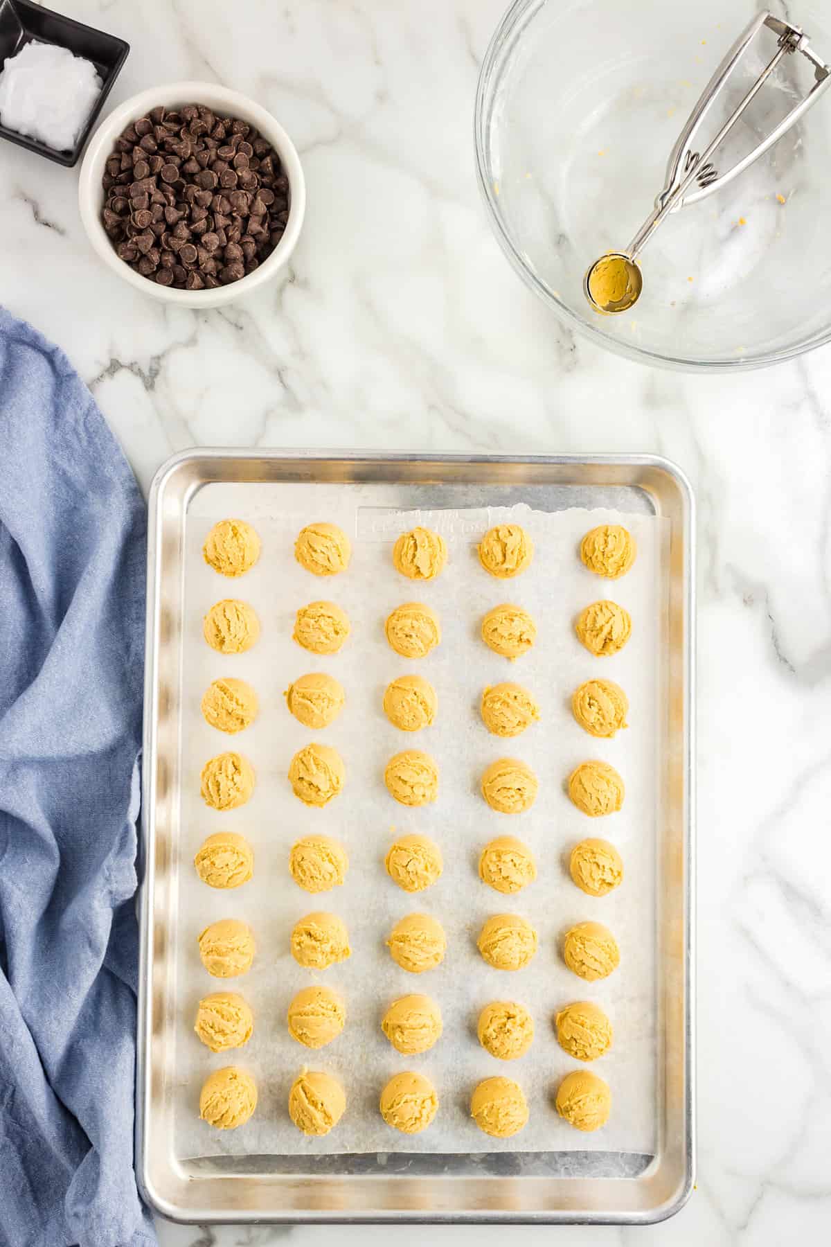 Peanut butter balls on baking sheet
