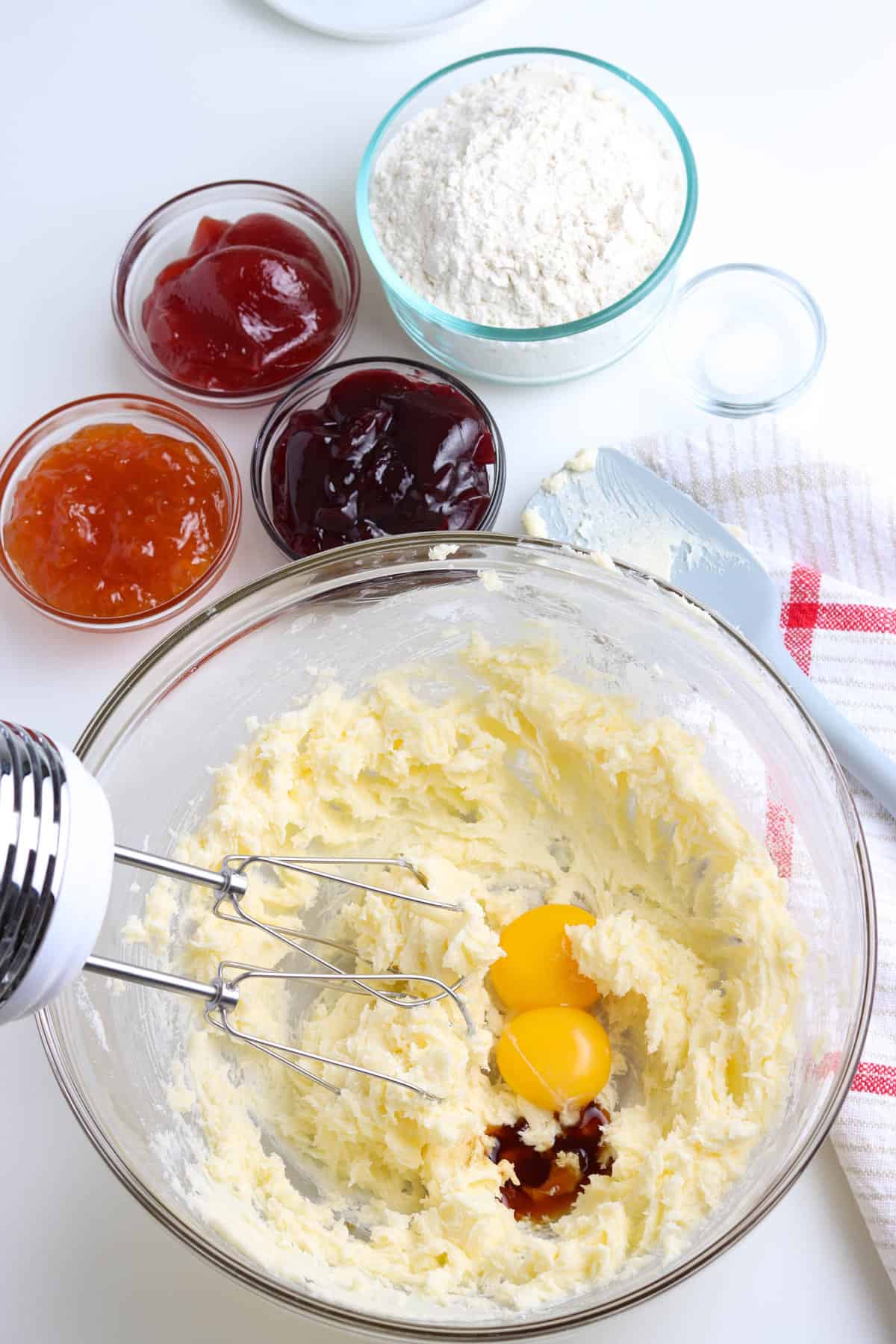 Mixing in Eggs to Thumbprint Cookie Recipe