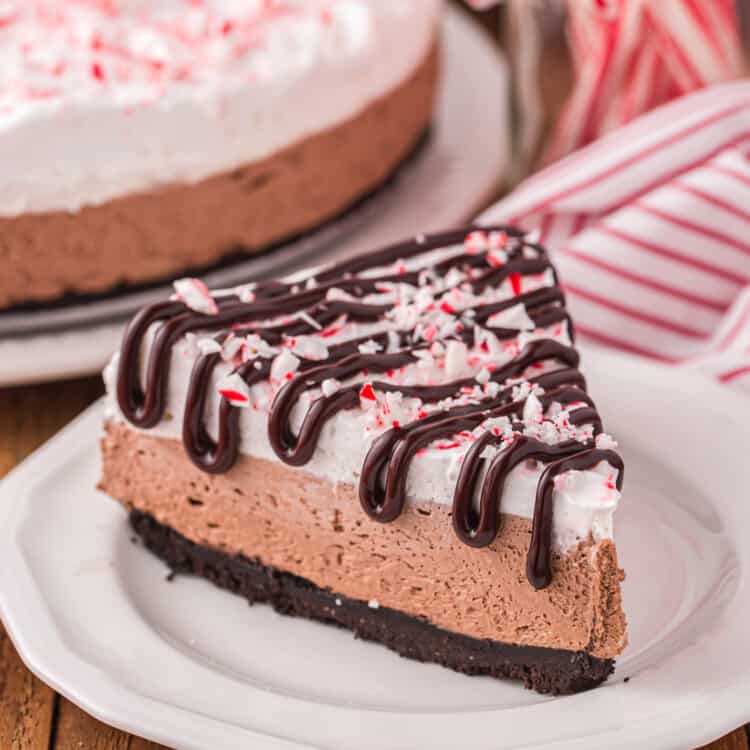 Slice of Peppermint Cheesecake on white plate