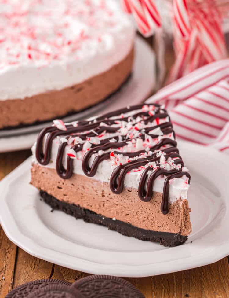Slice of Peppermint Cheesecake on white plate