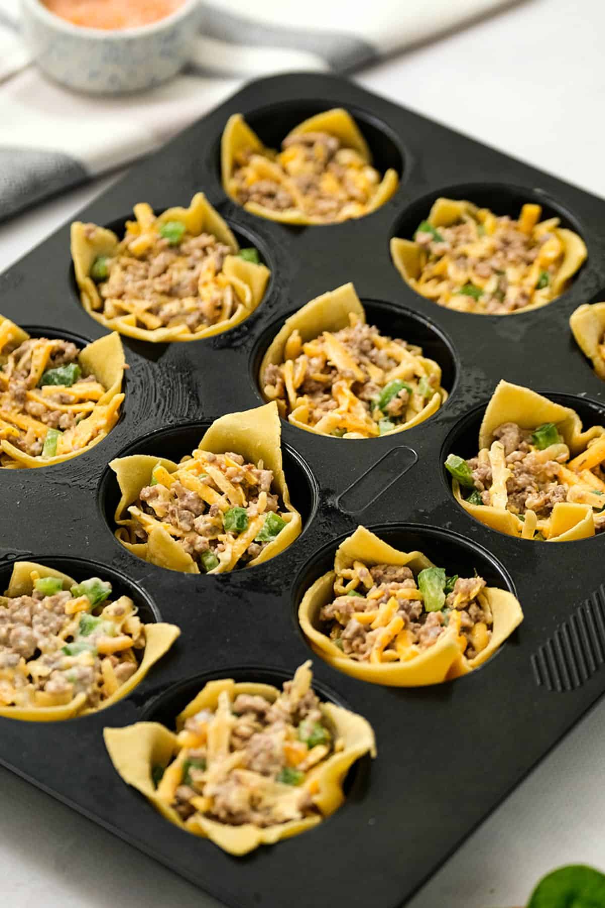 Savory Wontons Filled With Sausage and Other Ingredients Ready for Baking