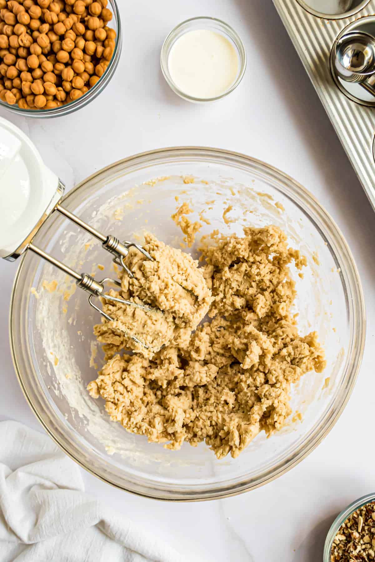 Mixing dough in bowl for cookie cups