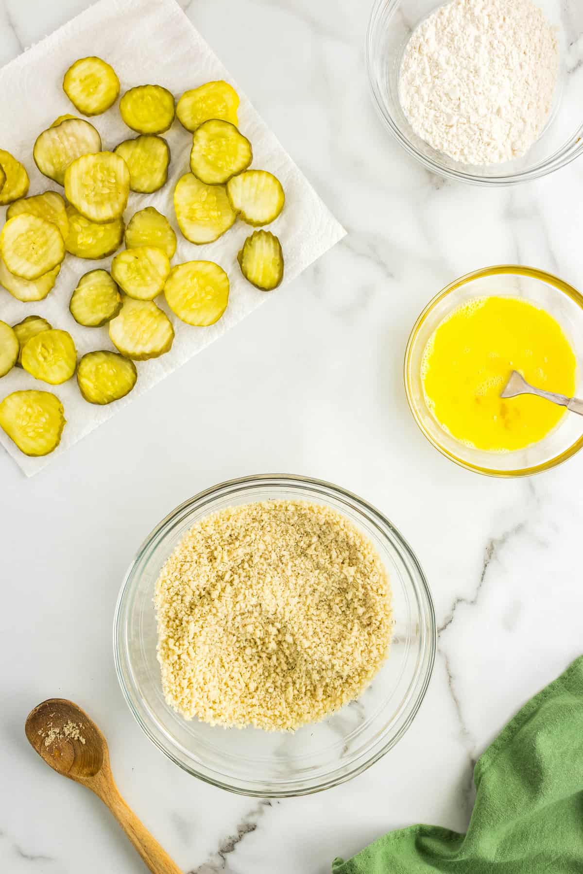 Quick and easy Air Fryer Fried Pickles are tangy, crunchy and perfectly seasoned. They are a delicious alternative to fried pickles with less calories, no splattered oil and just as yummy. Make this easy appetizer for all of your parties, the big game or just when you want a quick snack.