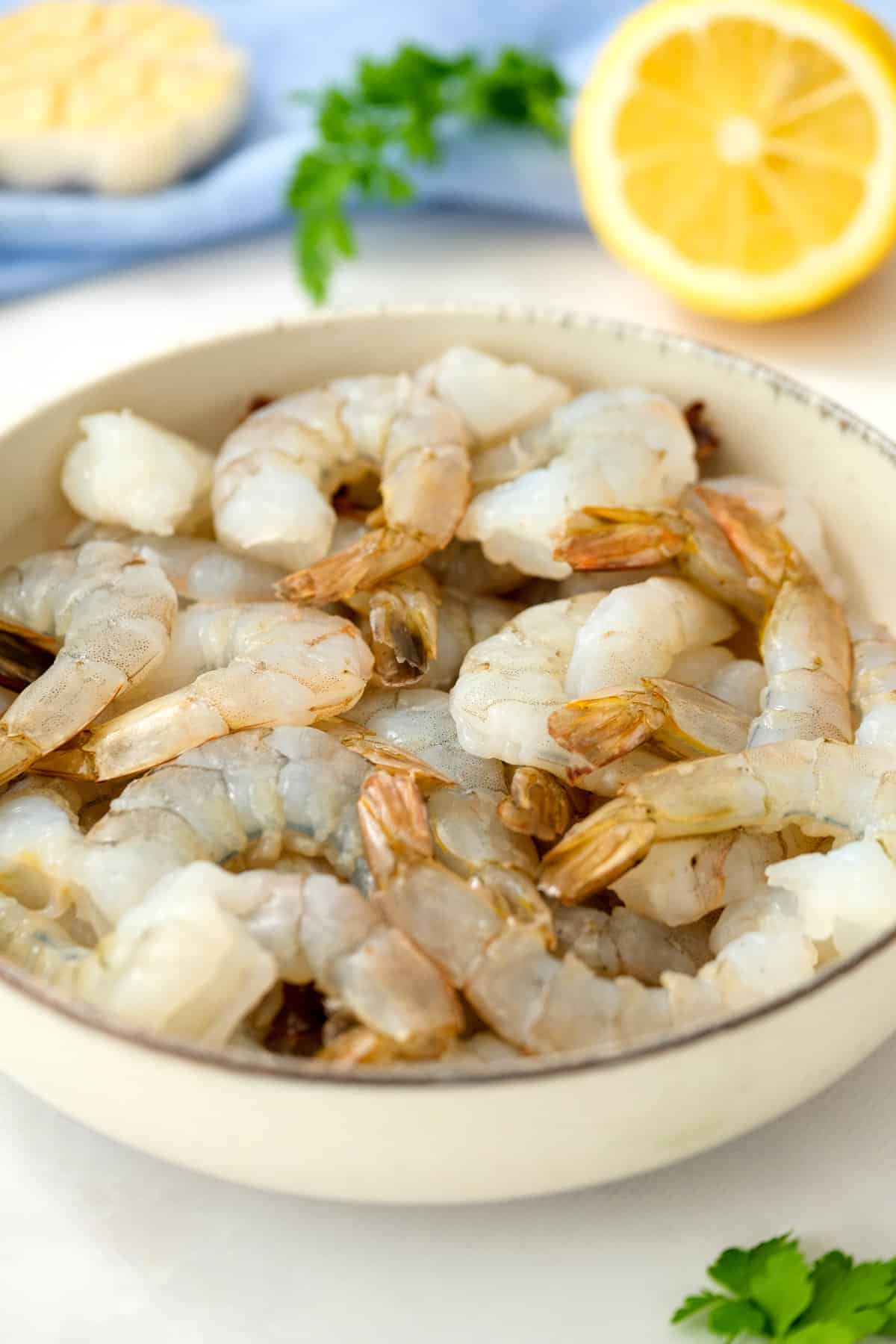 Bowl with raw shrimp