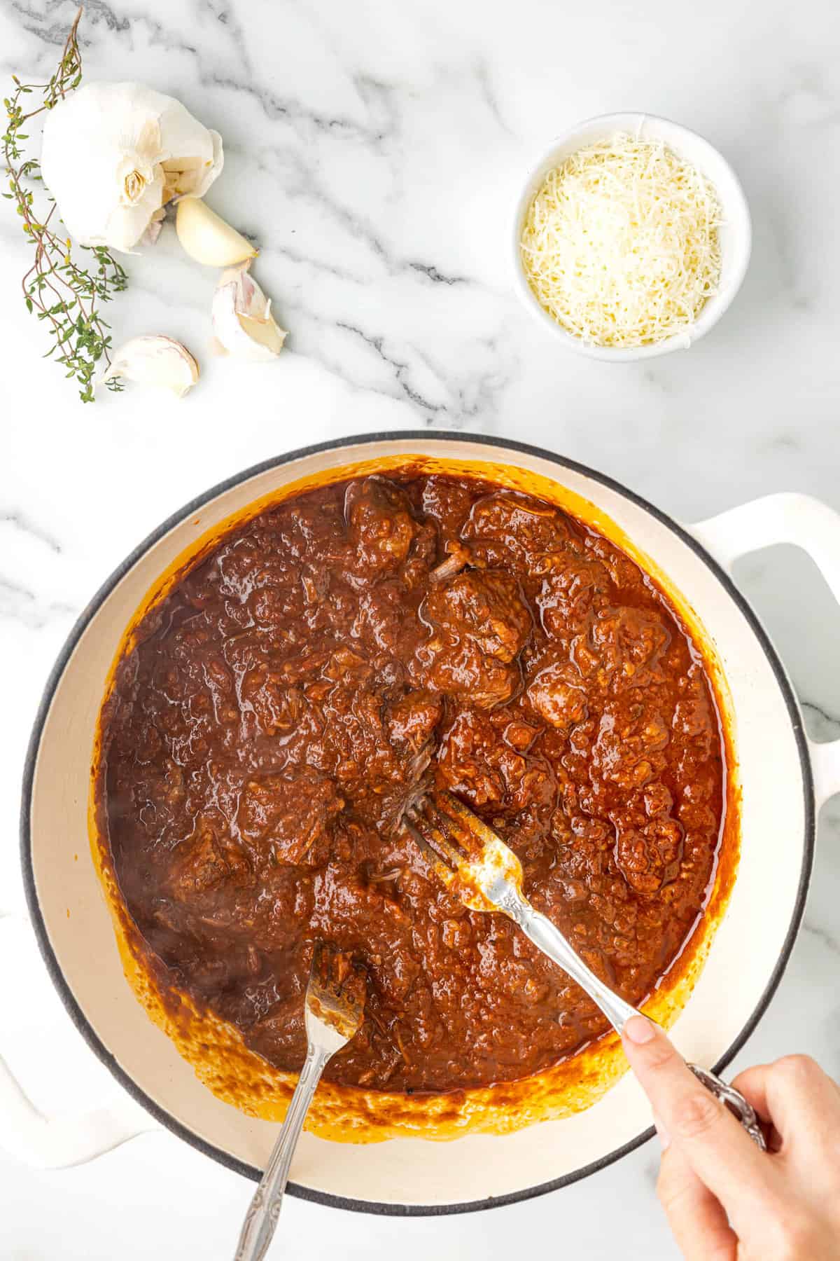 Stirring Pasta Sauce for Beef Ragu Recipe