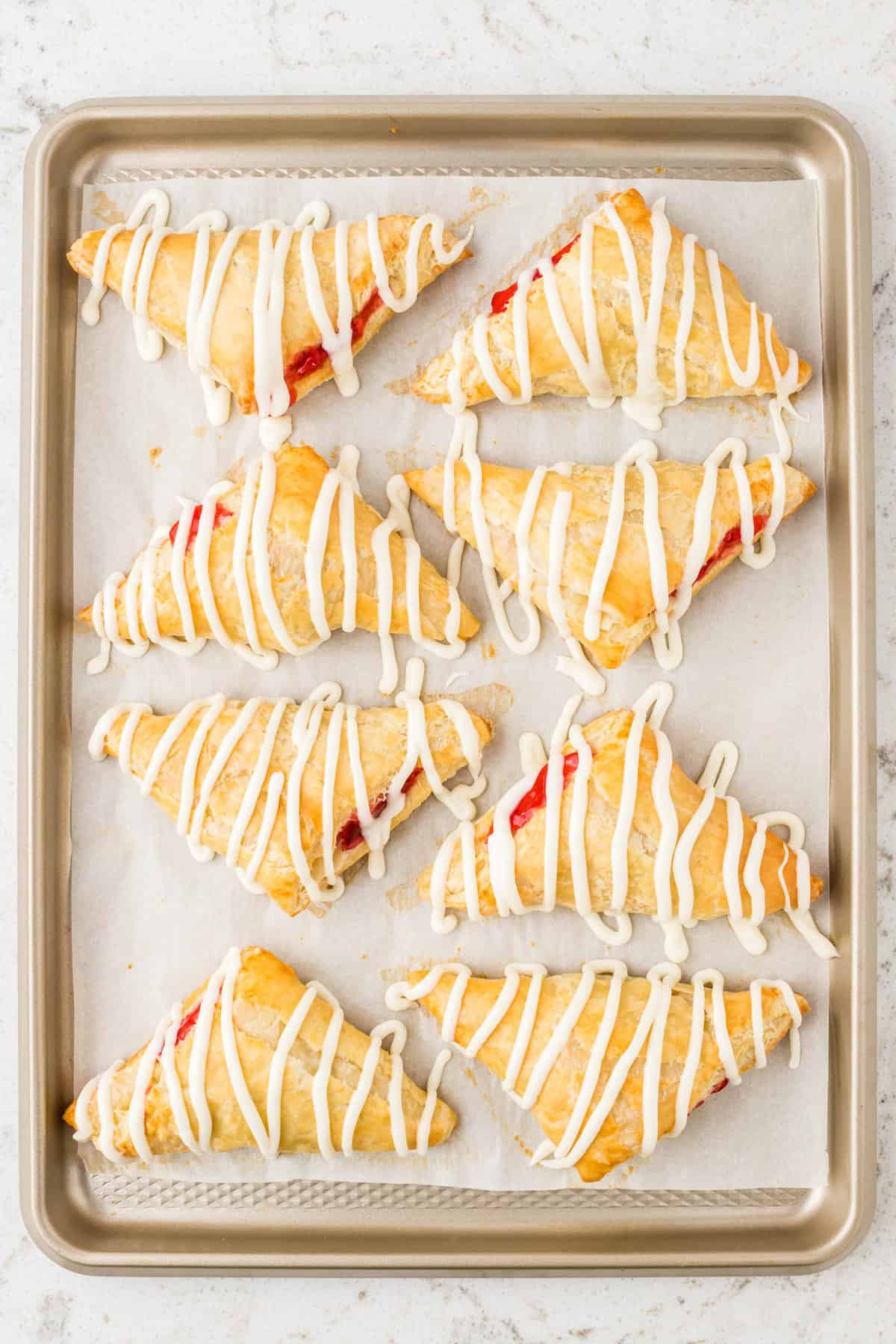 Homemade Cherry Turnovers Drizzled with Sweet Frosting