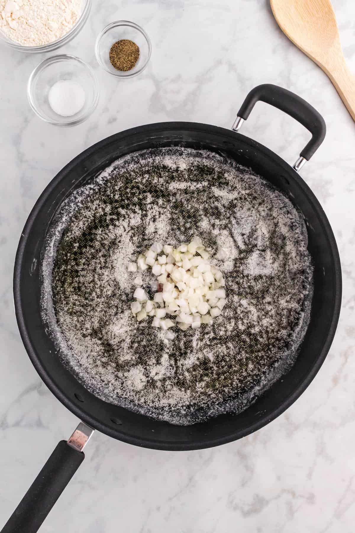 Overhead Image of Skillet with butter and onions