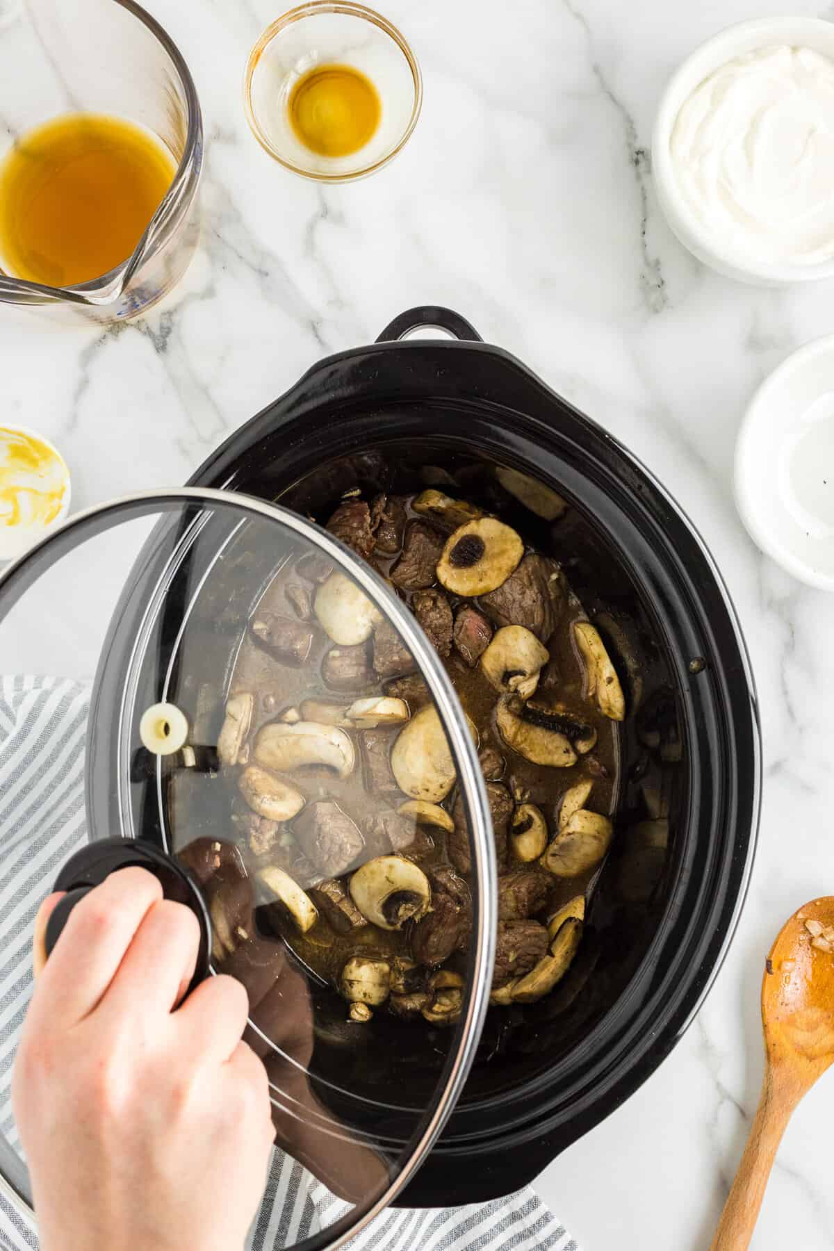 Putting cover on crock pot stroganoff