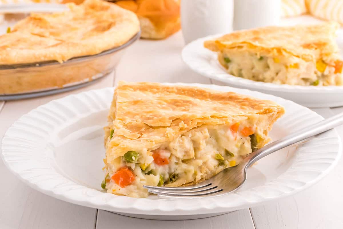 Flakey & Creamy Slice of Chicken Pot Pie on White Plate