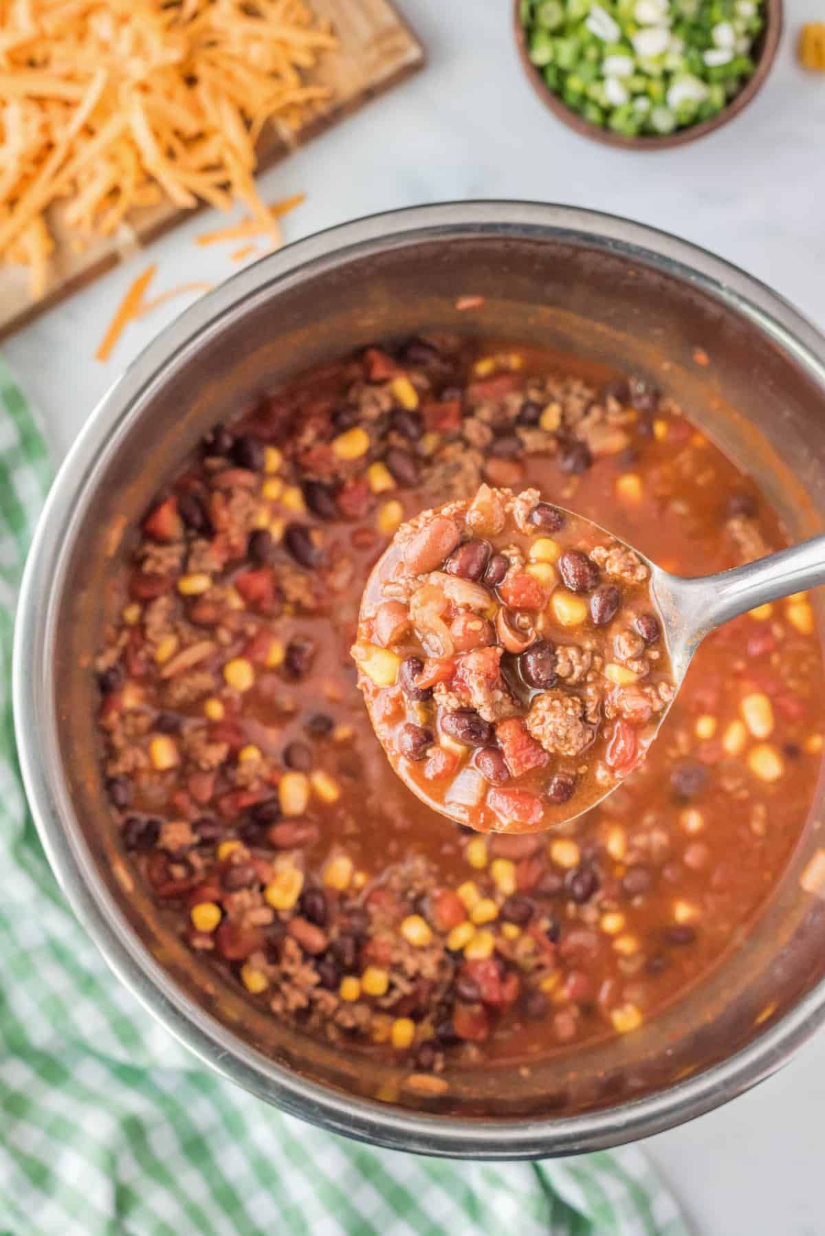 Ladeling The Soup from the Pressure Cooker for Instant Pot Beef Taco Soup