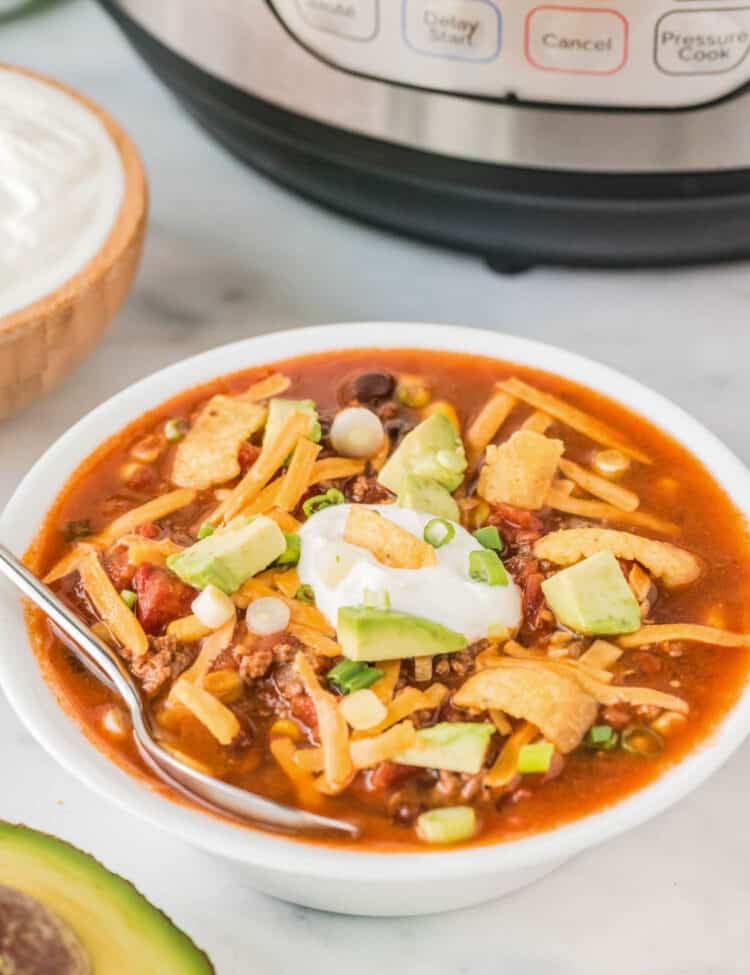 Instant Pot Taco Soup in Bowl with the Fixings