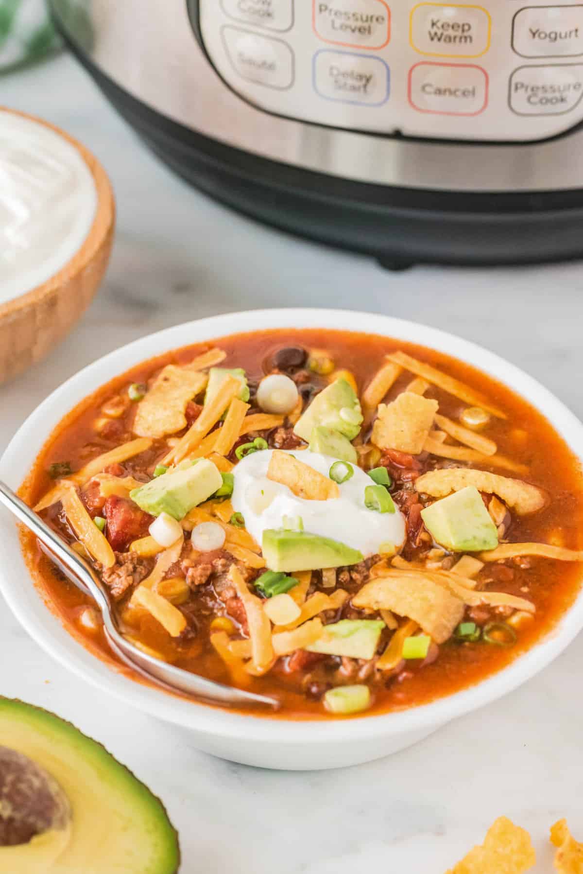 Instant Pot Taco Soup in Bowl with the Fixings