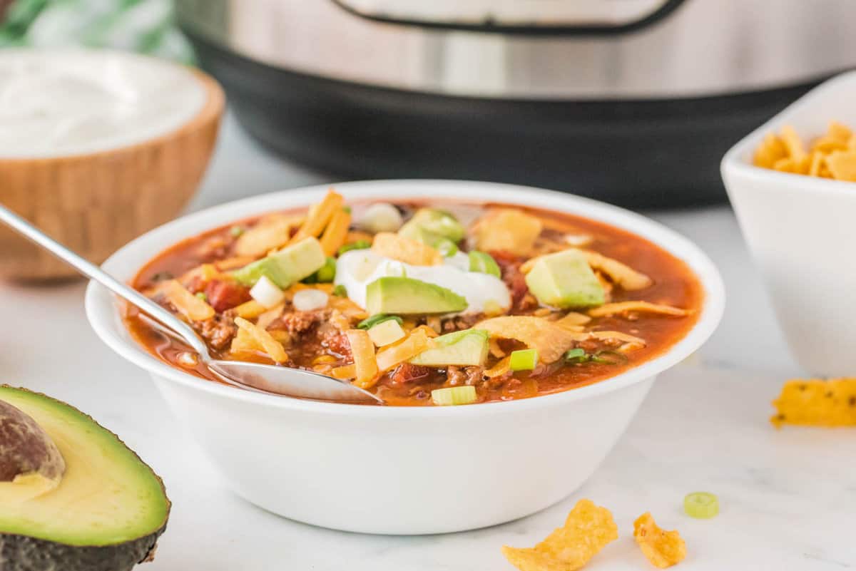 Instant Pot Beef Taco Soup Recipe in Bowl Loaded with Toppings