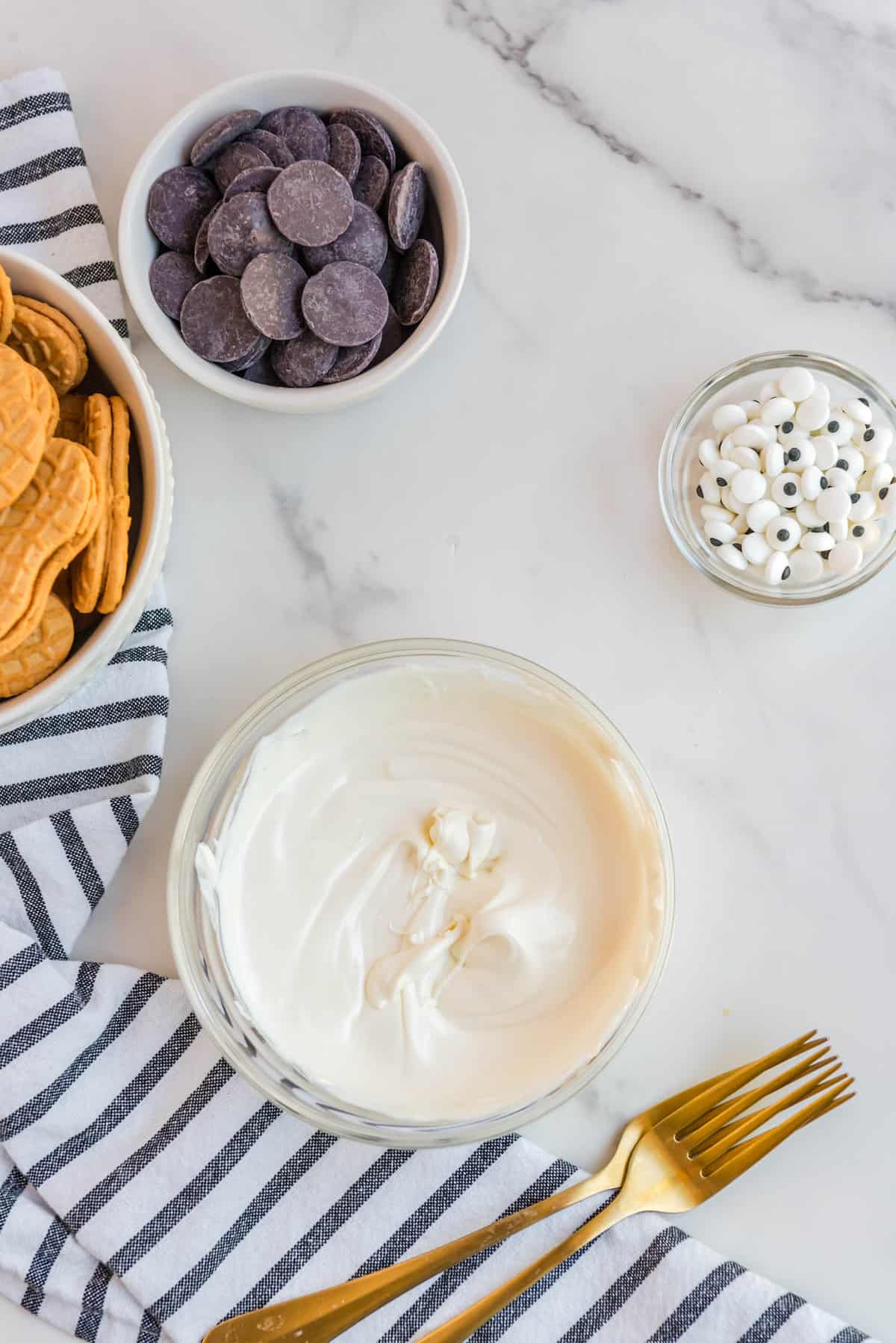 White Candy Melts in Clear Bowl for Nutter Butter Referees