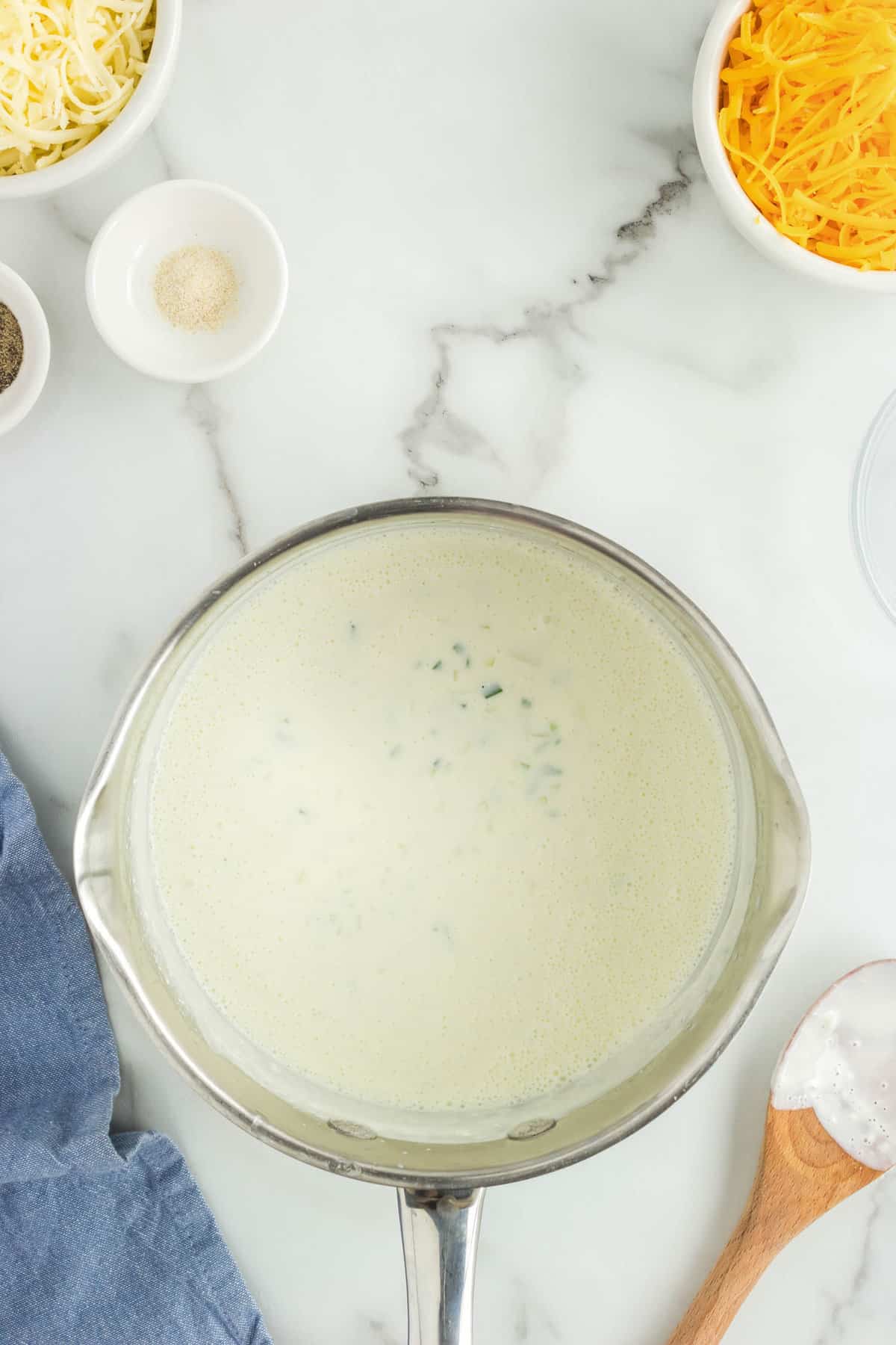 Butter, Onion, Jalepeno, and Creamed Blended Until Smooth in Saucepan for Homemade Queso Recipe