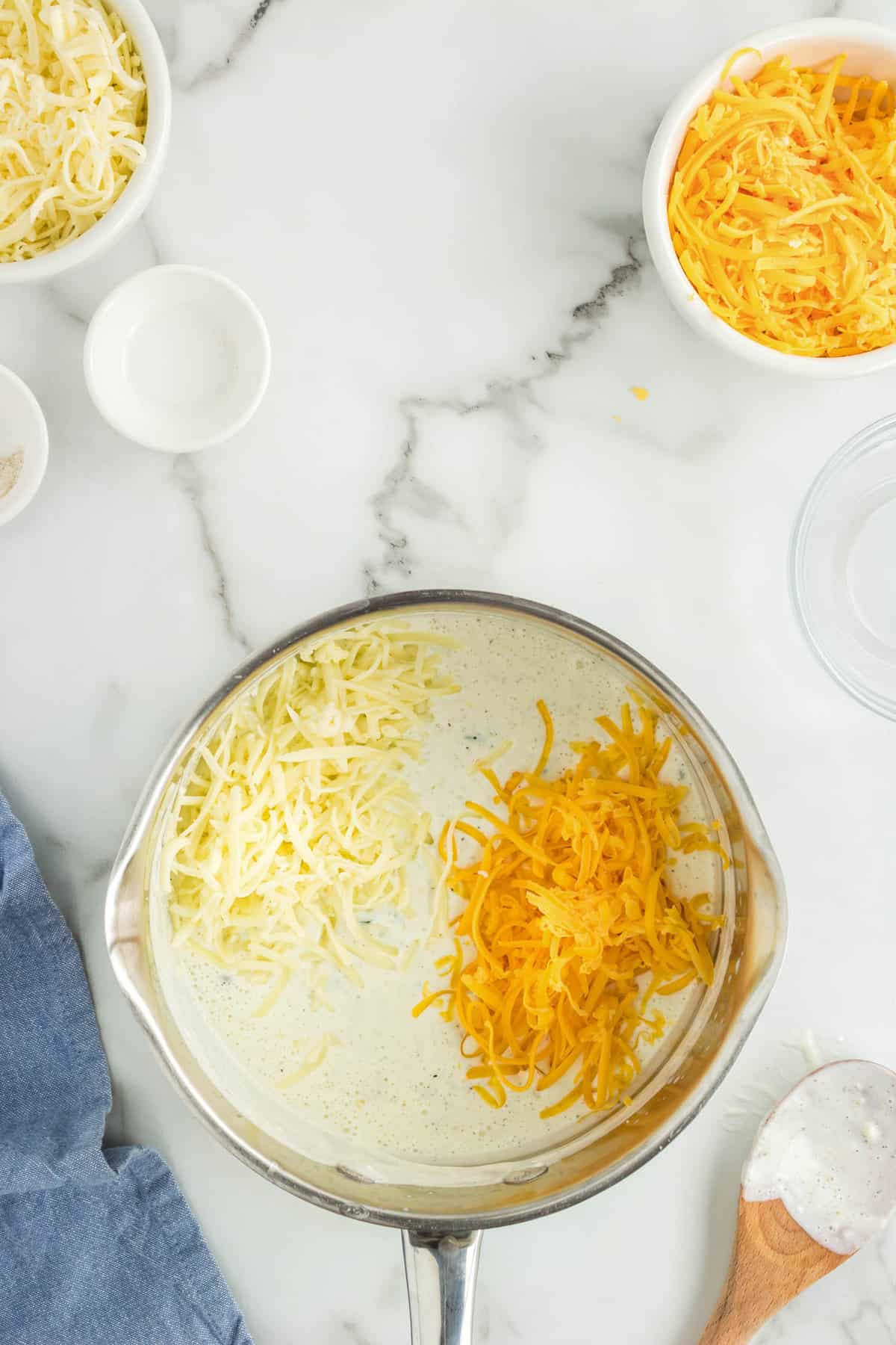 Adding Cheddar and Montery Cheese to Queso Dip