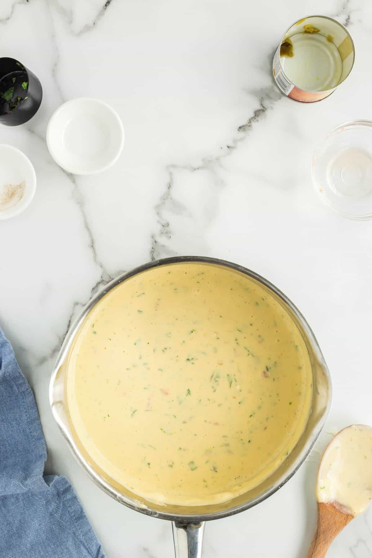 Perfectly Blended Homemade Queso Dip in Saucepan