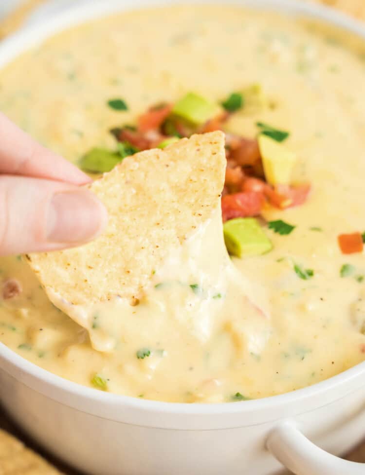 Queso Dip Recipe in White Bowl Topped with Pico Ready to Enjoy