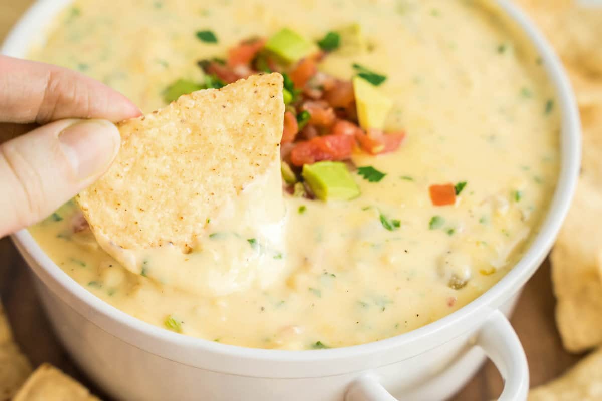 Queso Dip Recipe Topped with Pico and Tortilla Chips for Dippers