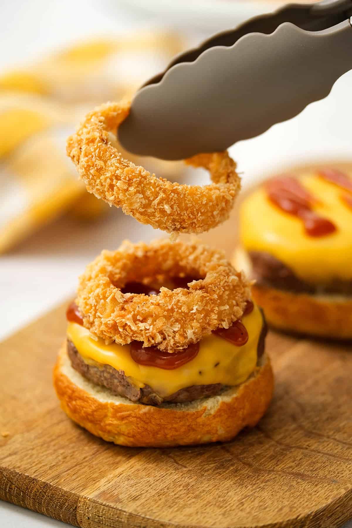 Rodeo Burger Topped with Crispy Onion Rings and BBQ Sauce