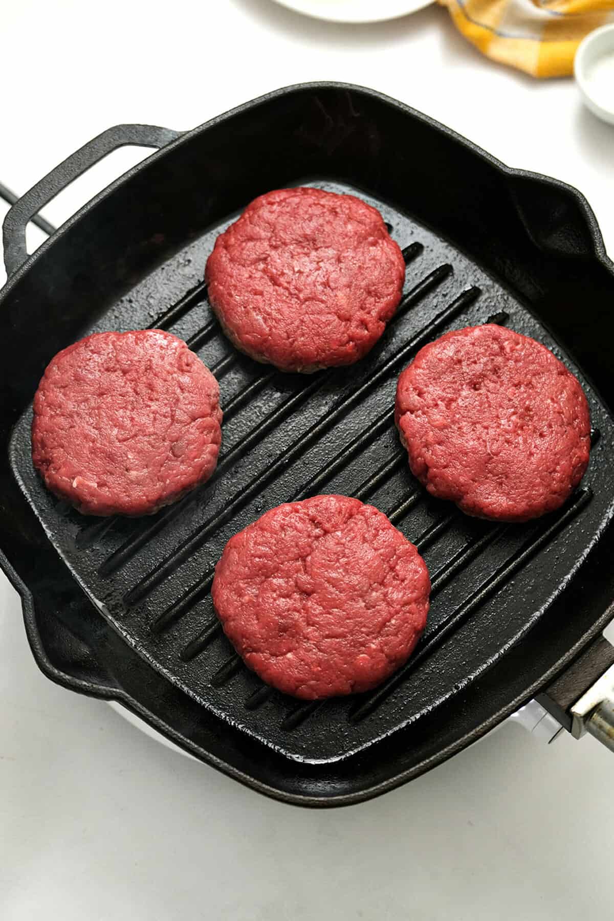 Rodeo Burger Patties on Greased Grill