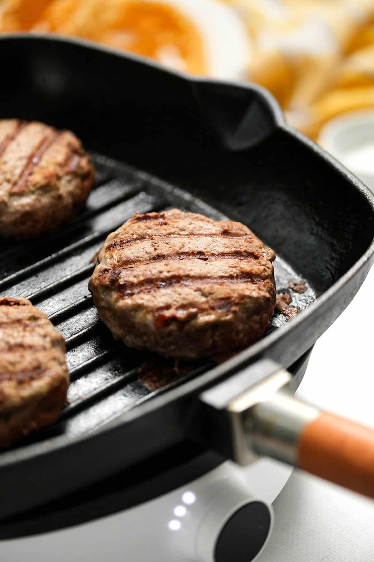 Rodeo Burger Recipe with Patties on Greased Grill