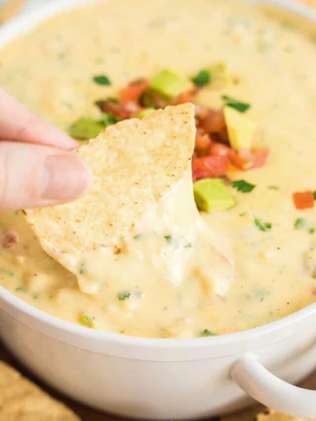 Queso Dip Recipe in White Bowl Topped with Pico Ready to Enjoy