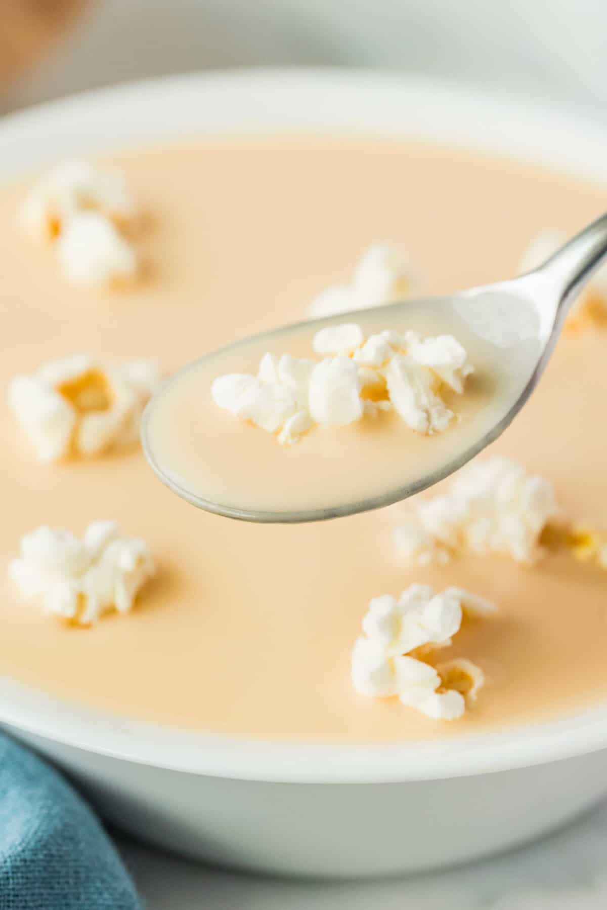 Creamy and Delicious Beer Cheese Soup Topped with Popcorn