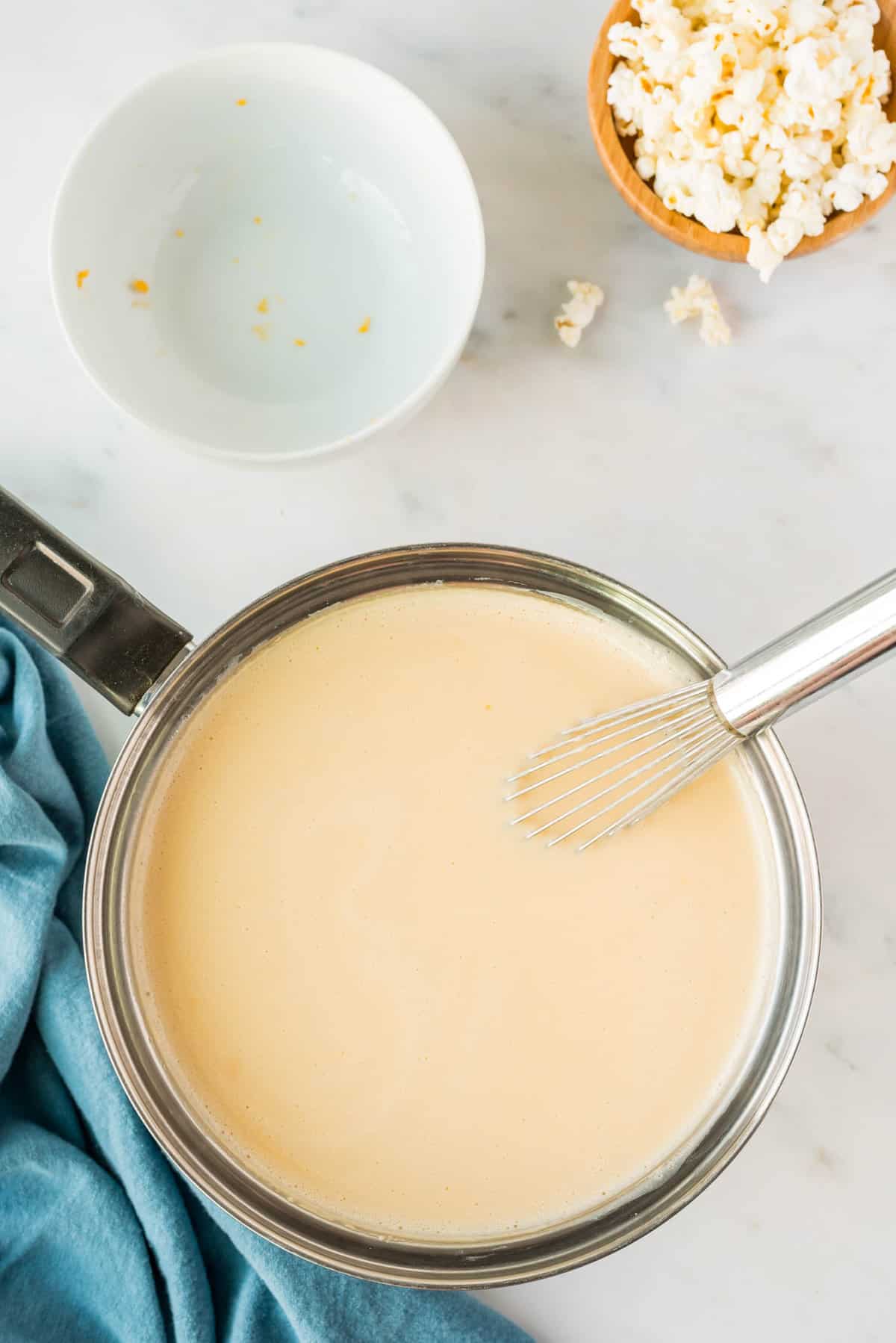 Whisking in Velveeta Cheese for Beer Cheese Soup
