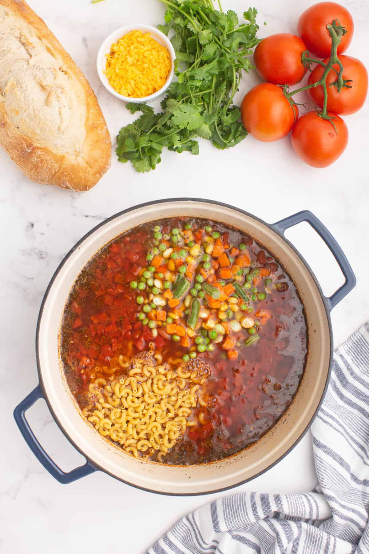 Adding Macaroni and Vegetables to Hamburger Macaroni Soup Recipe
