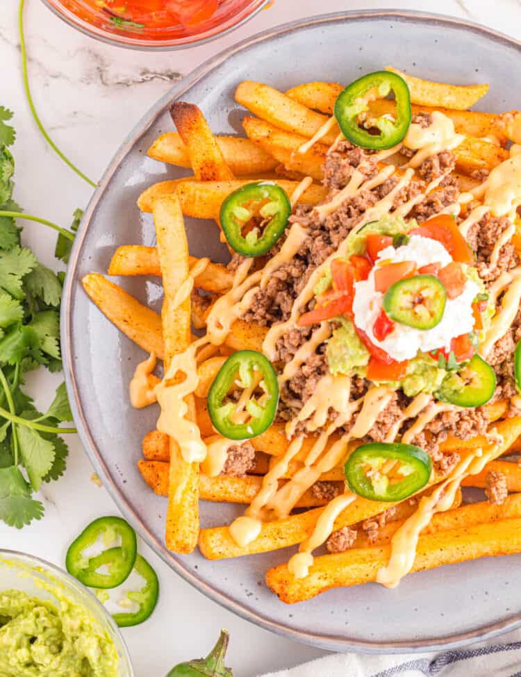 Taco Bell Nacho Fries Recipe Loaded with Toppings