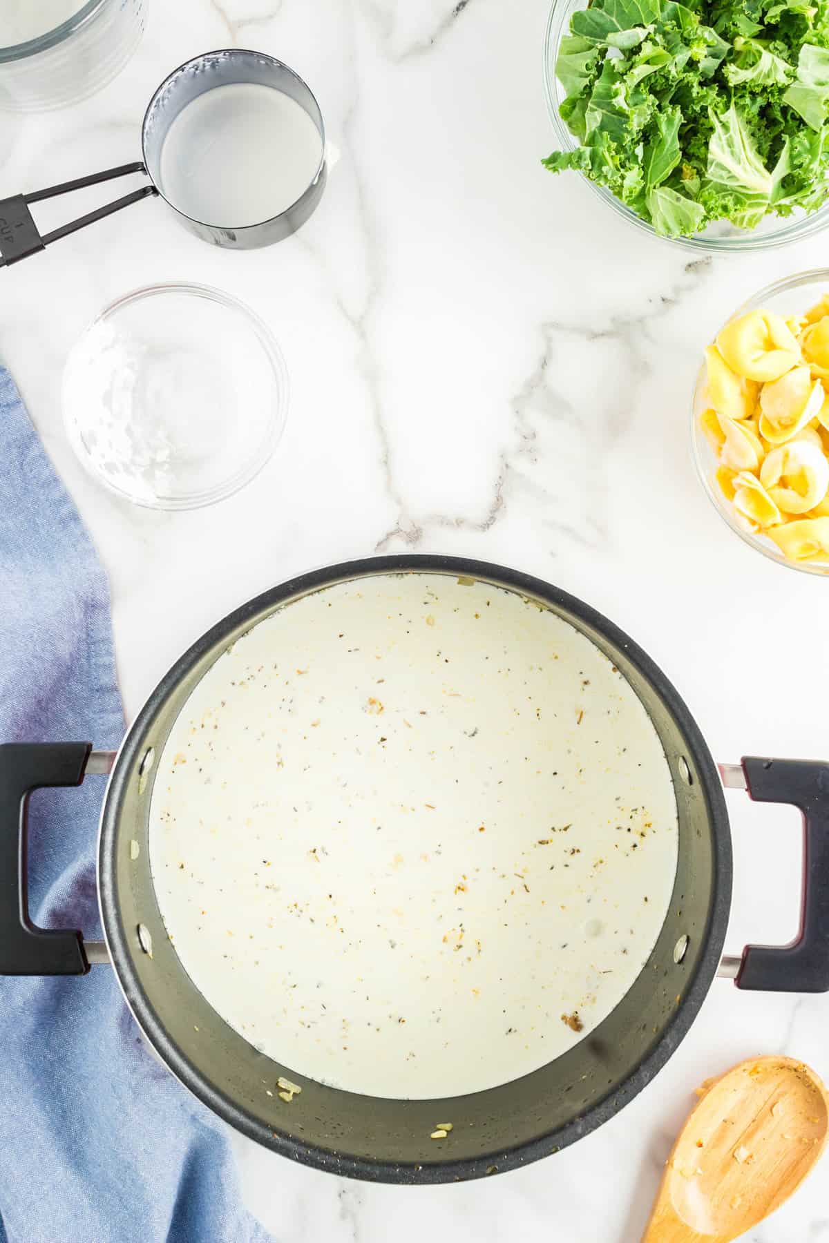 Blending Ingredients for Creamy Italian Sausage Tortellini Soup