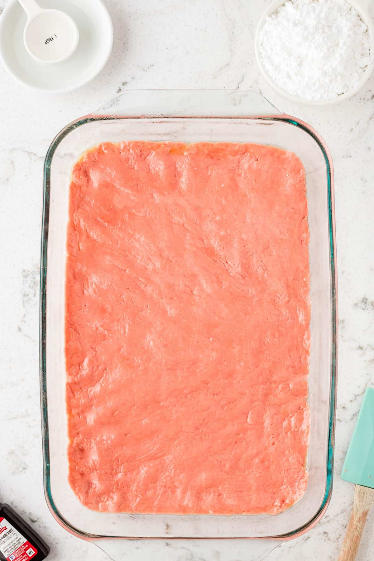 Spreading Batter in 9x13 Baking Dish for Strawberry Brownies