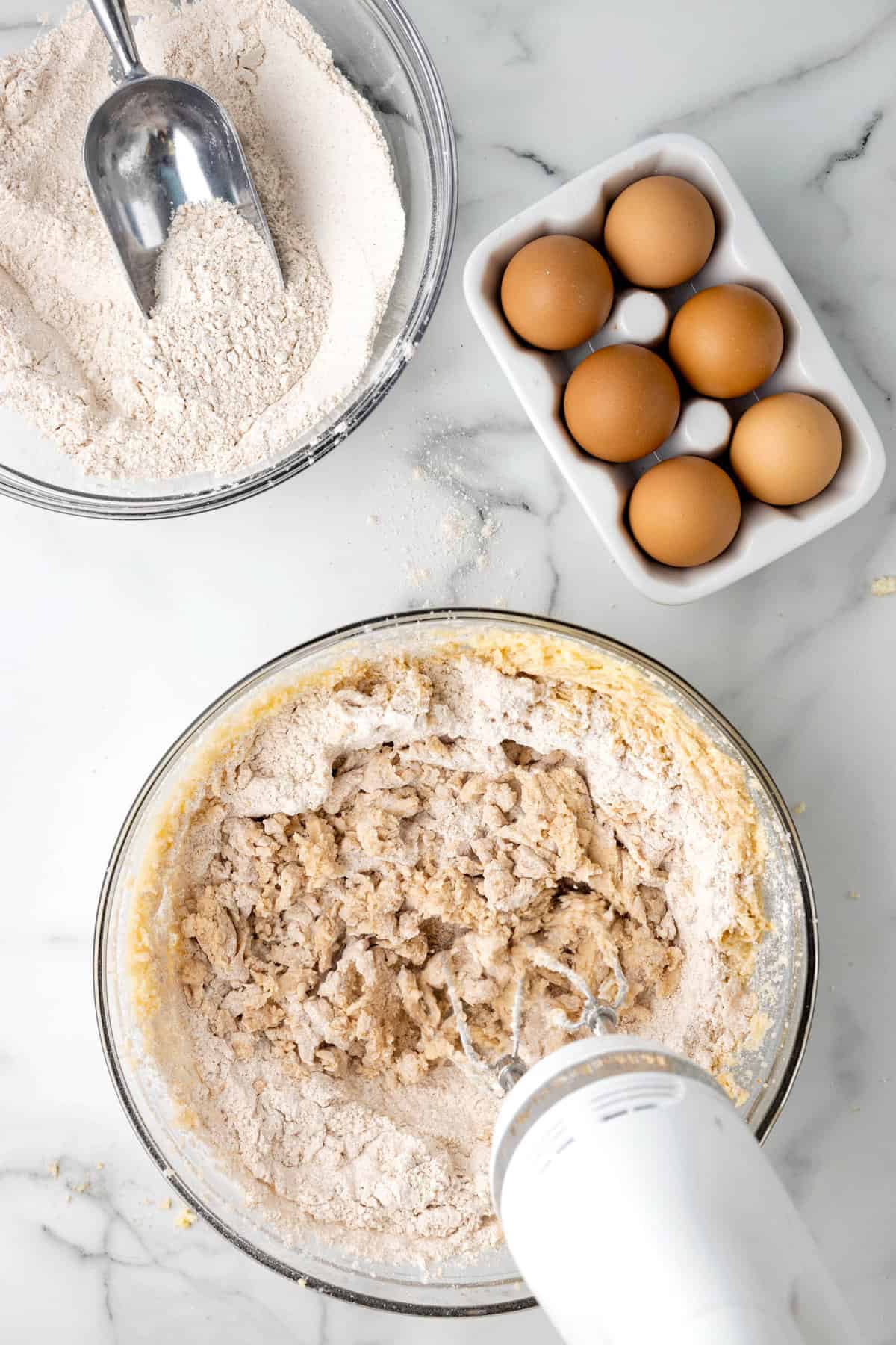 Using Mixer to Blend Wet and Dry Ingredients for Adding Egg to the Wet Ingredients for Carrot Cake Cookies