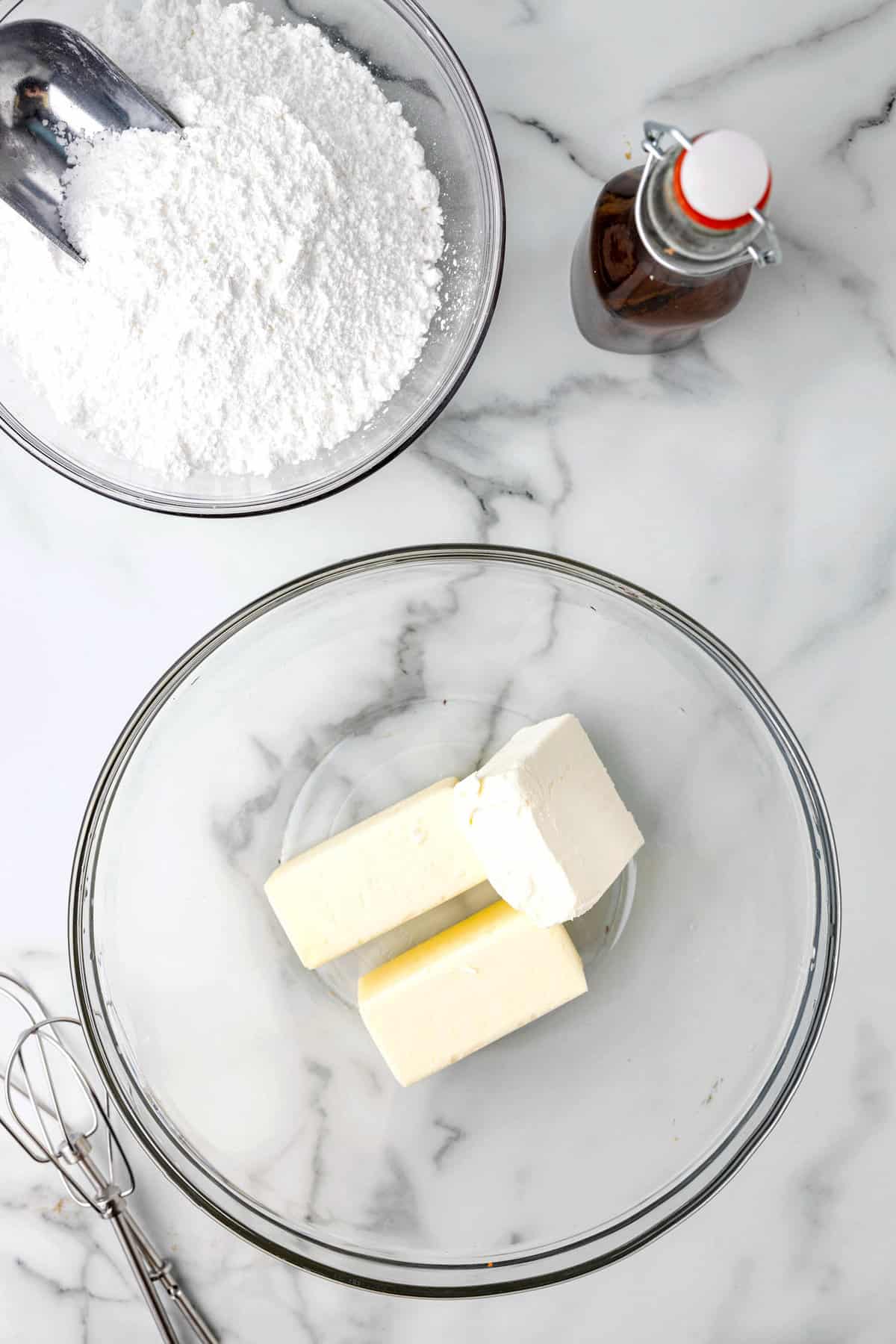 Adding Cream Cheese to Butter in Mixing Bowl for Carrot Cake Cookies Frosting