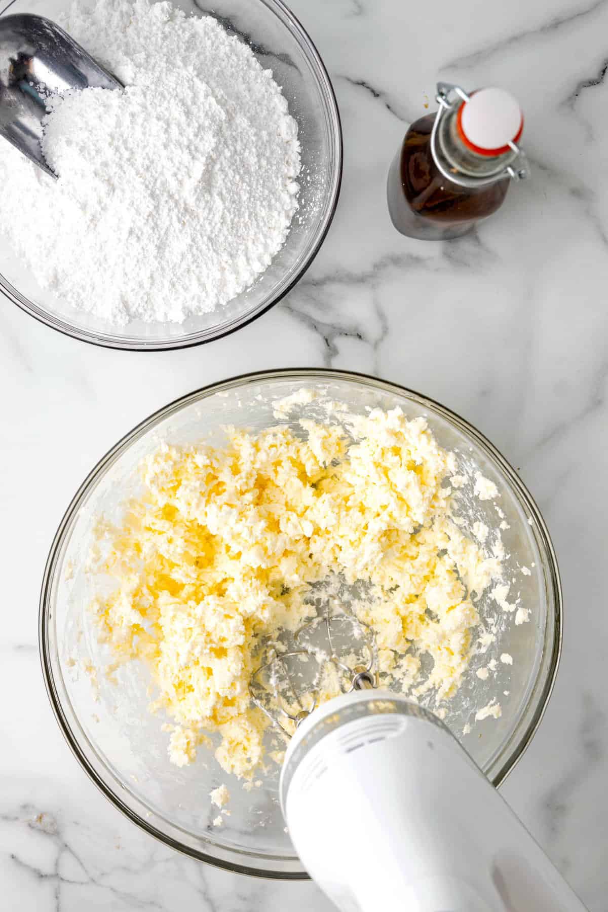 Creaming Together Butter and Cream Cheese for Carrot Cake Cookies Frosting