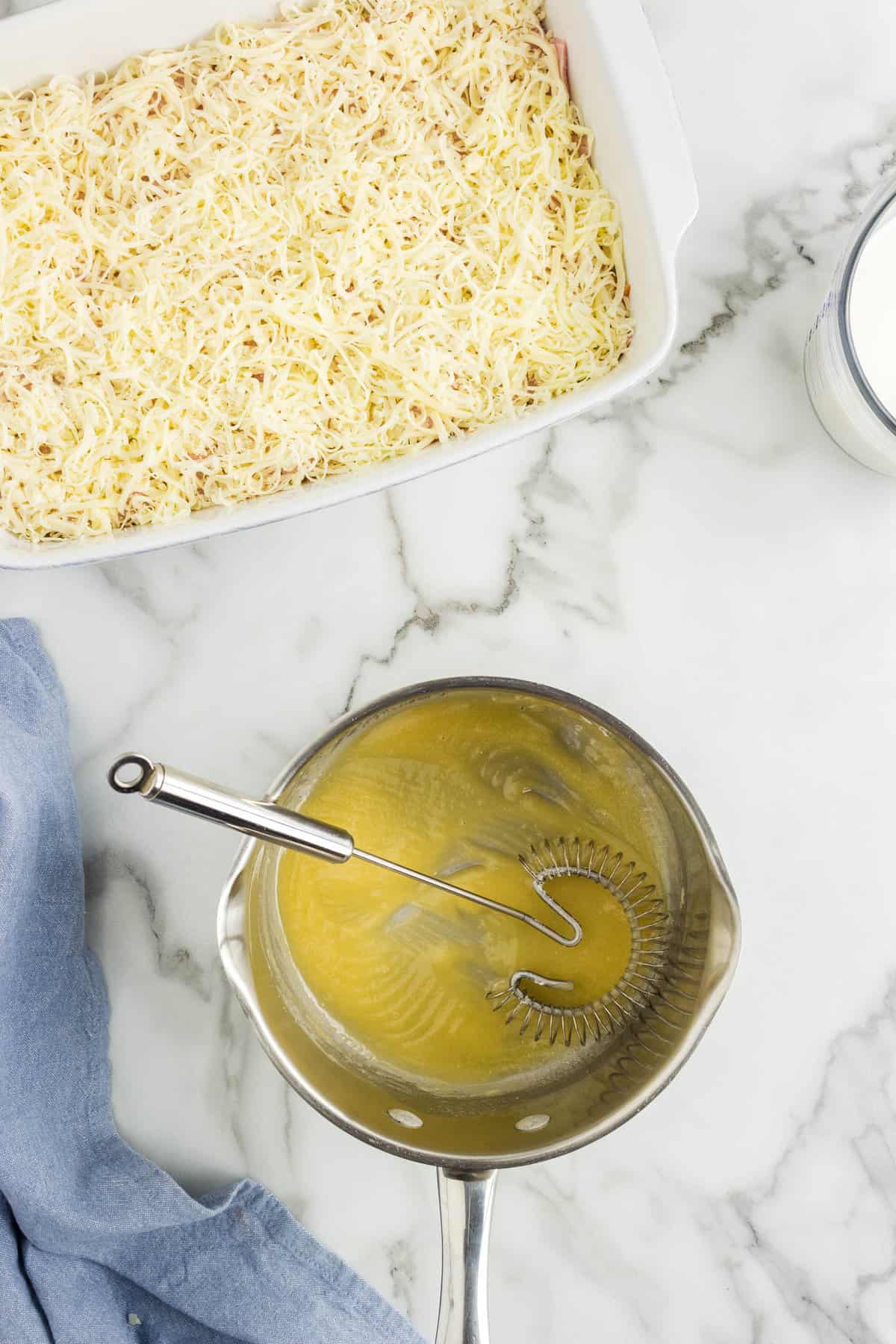 Melting Butter in Saucepan for Chicken Cordon Bleu Casserole Recipe