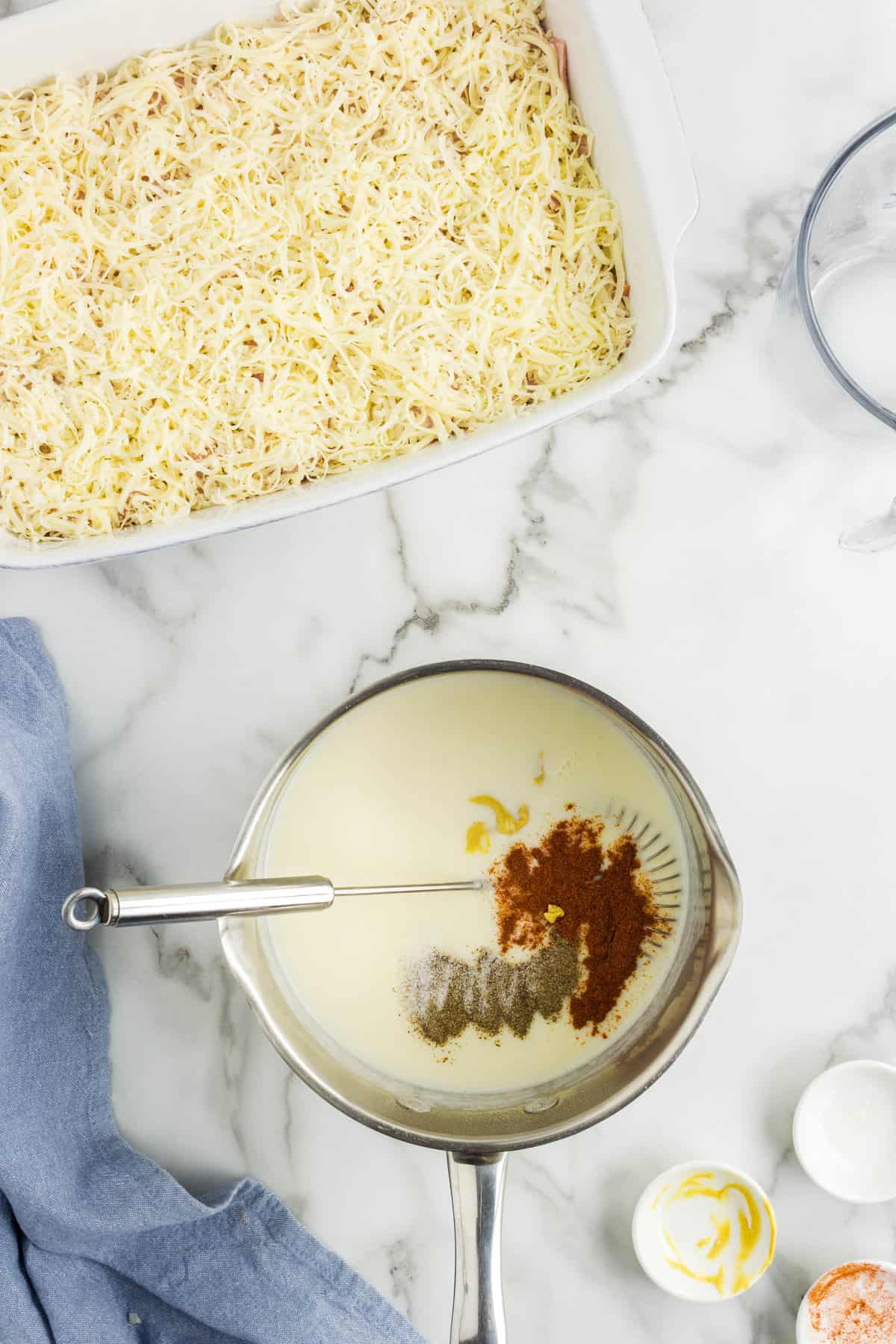 Adding Flour and Seasoning to Chicken Cordon Bleu Casserole Sauce Micture