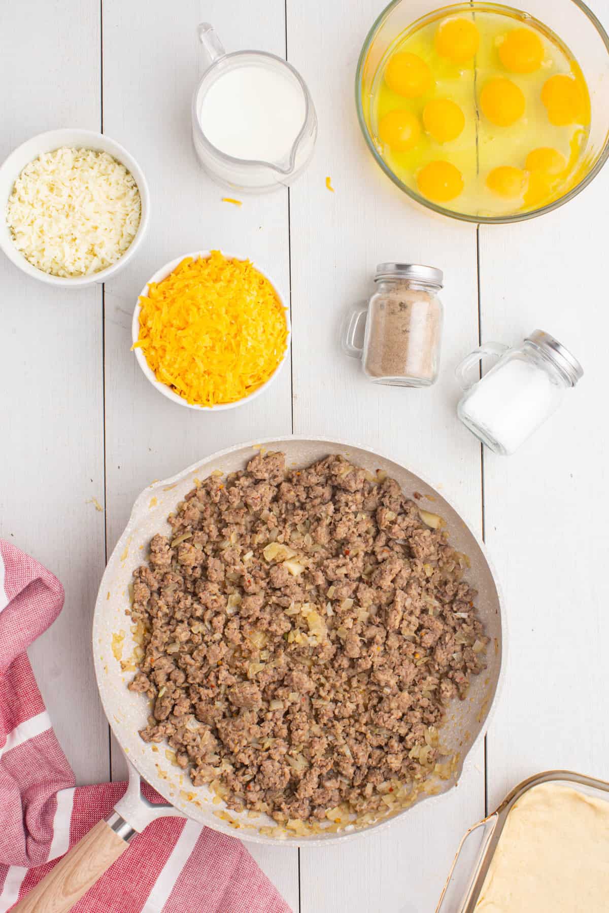 Browning Pork Sausage in Skillet for Breakfast Casserole using Crescent Rolls