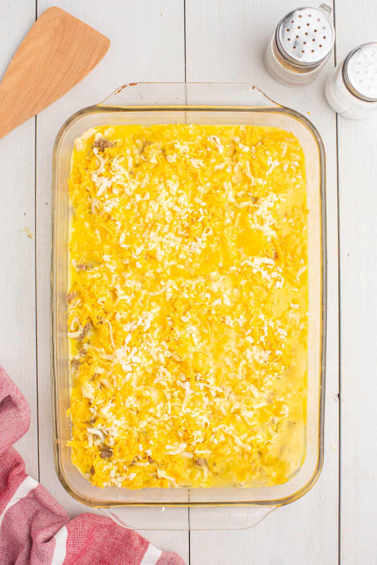 Topping Crescent Roll Egg Bake with Cheese in 9x13 Baking Dish