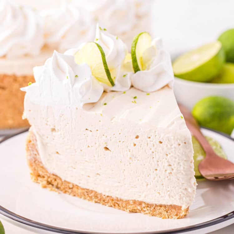 Slice of Keylime cheesecake on white plate