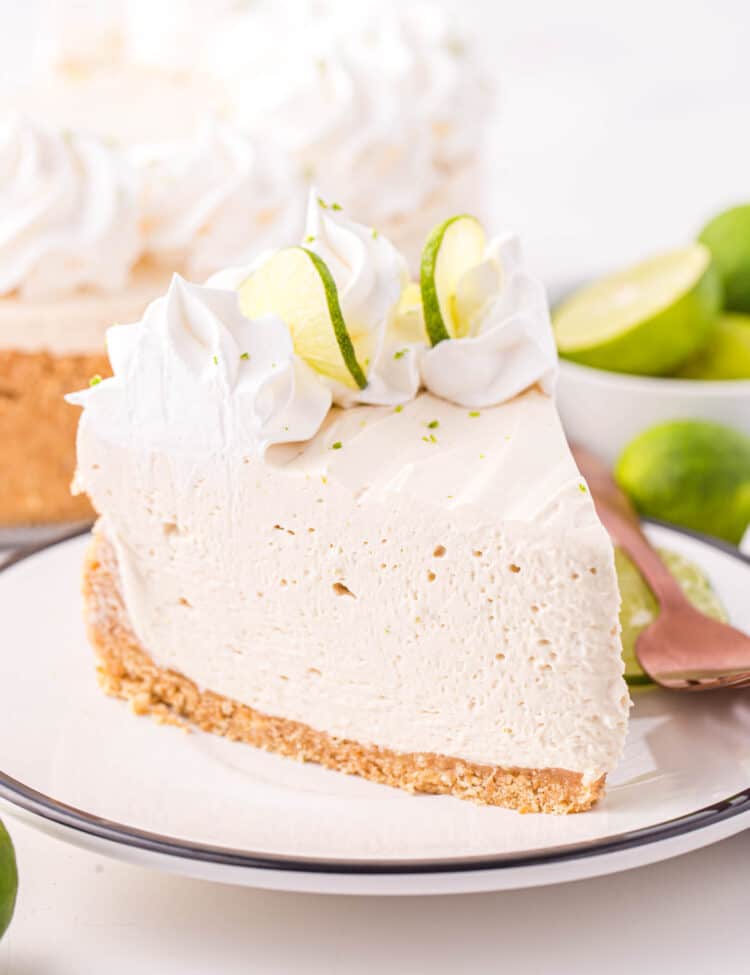 Slice of Keylime cheesecake on white plate