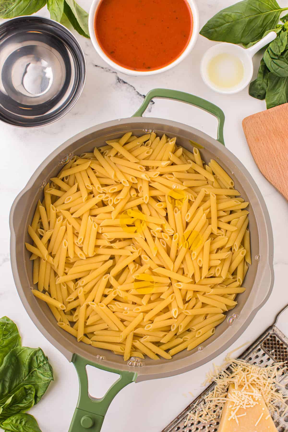 Penne Pasta, Water, and Oil Ready to Boil for Penne alla Vodka Recipe